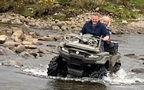 Quad biking across the river